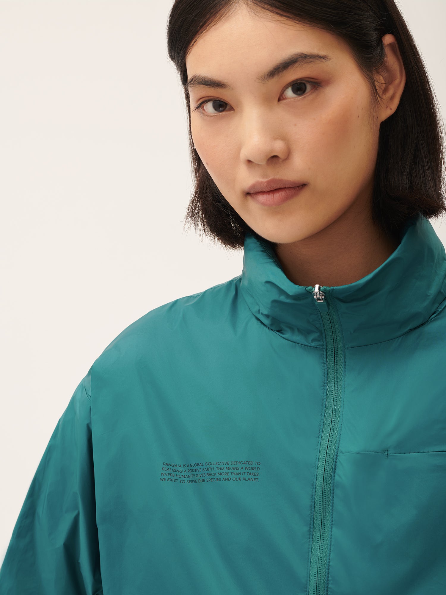 female_DNA_Recycled_Nylon_Packable_Jacket_Scarab_Teal--7